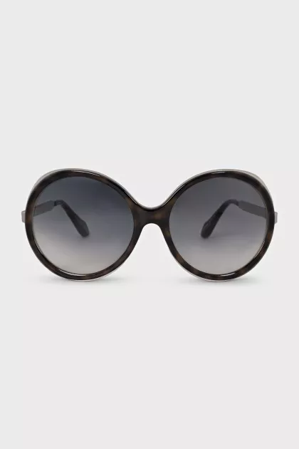 Grand sunglasses with a combined frame