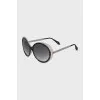 Grand sunglasses with a combined frame