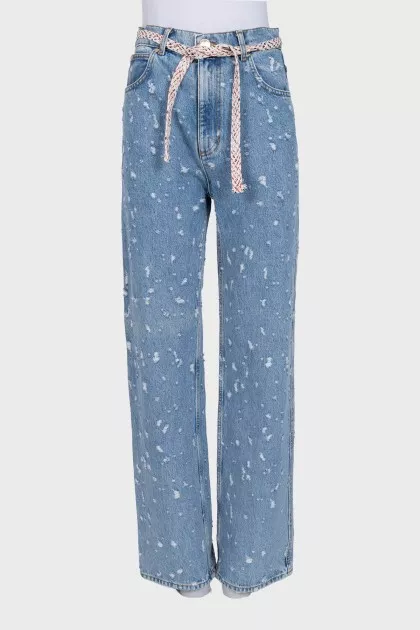 Blue jeans with a distressed effect