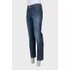 Men's blue jeans with silver logo