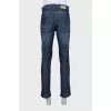 Men's blue jeans with silver logo