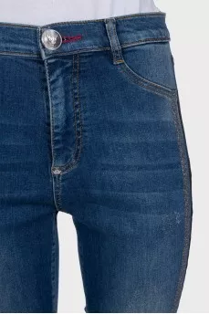 Blue jeans with shiny inserts