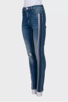 Blue jeans with shiny inserts
