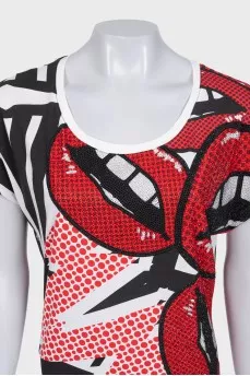 A straight dress decorated with rhinestones in a print