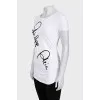White T-shirt with a signature print and rhinestones