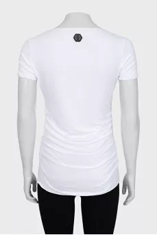 White T-shirt with a signature print and rhinestones