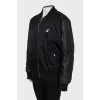 Black jacket with brand logo