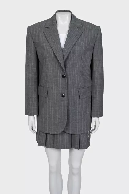 Pinstripe suit consisting of a jacket and skirt