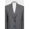 Pinstripe suit consisting of a jacket and skirt