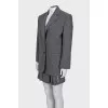 Pinstripe suit consisting of a jacket and skirt