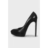 Black leather shoes with studs