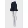 Black high-waist pleated skirt
