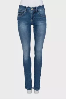 Slim-fit blue jeans with a low rise