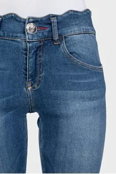 Slim-fit blue jeans with a low rise