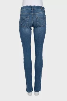 Slim-fit blue jeans with a low rise