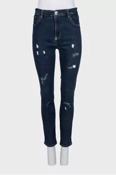 High rise skinny jeans with distressing