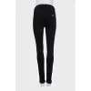 Black skinny-fit jeans with embellishments