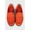 Orange leather loafers