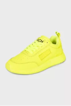 Yellow leather sneakers with the brand logo
