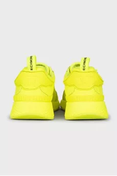 Yellow leather sneakers with the brand logo