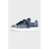 Blue sneakers with chunky laces