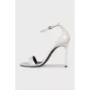 White patent leather stiletto sandals