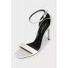 White patent leather stiletto sandals