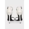 White patent leather stiletto sandals