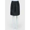 Large pleated graphite skirt