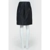 Large pleated graphite skirt