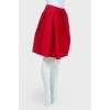 Asymmetric pleated skirt