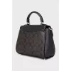 Leather satchel with signature print