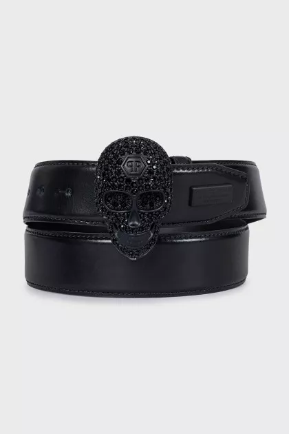 Men's leather belt with a decorated buckle