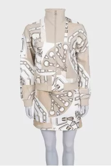 Printed suit consisting of a zip-up hoodie and a skirt