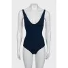 Blue one-piece swimsuit with tag
