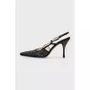 Black slingbacks decorated with rhinestones