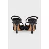 Black slingbacks decorated with rhinestones