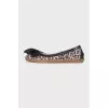 Animal print ballet flats with a bow