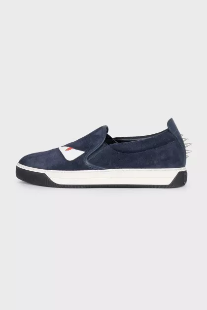 Men's suede slip-ons decorated with studs