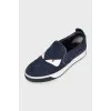 Men's suede slip-ons decorated with studs