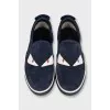 Men's suede slip-ons decorated with studs