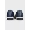 Men's suede slip-ons decorated with studs