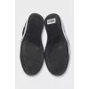 Men's suede slip-ons decorated with studs