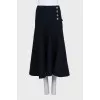 Blue skirt with golden buttons
