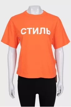 Orange T-shirt with a signature print