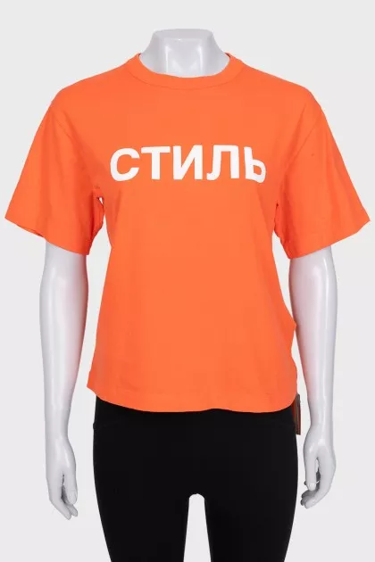 Orange T-shirt with a signature print
