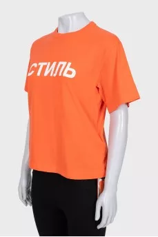 Orange T-shirt with a signature print