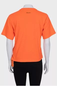 Orange T-shirt with a signature print