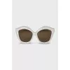 Sunglasses with white shaped frames