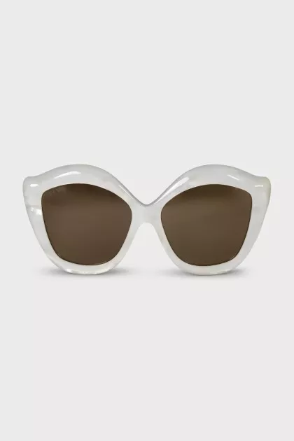 Sunglasses with white shaped frames